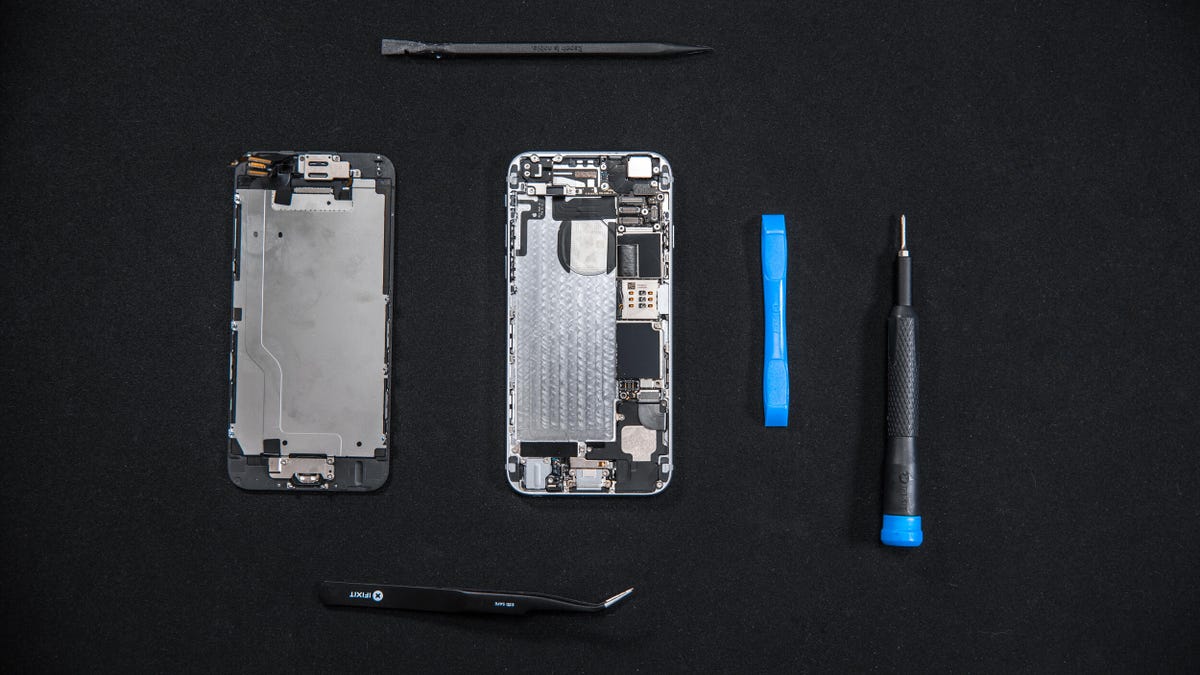 iPhone 6 dismantled on a black surface